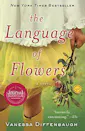 The cover of a book titled "The Langauge of Flowers: A Novel." The book cover features a child holding flowers, the fingertip just in frame, wearing a yellow skirt and white top.